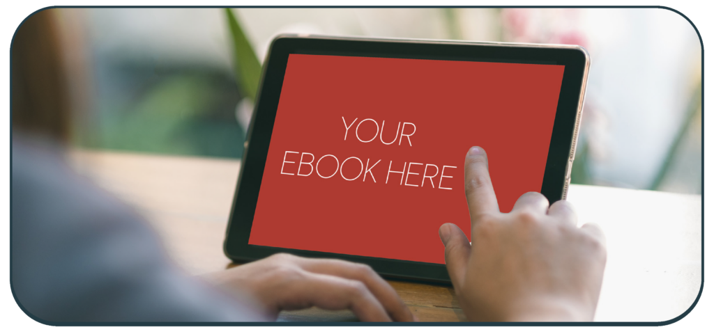 Man taps on iPad screen; message on screen says "Your ebook here" to demonstrate a mock-up